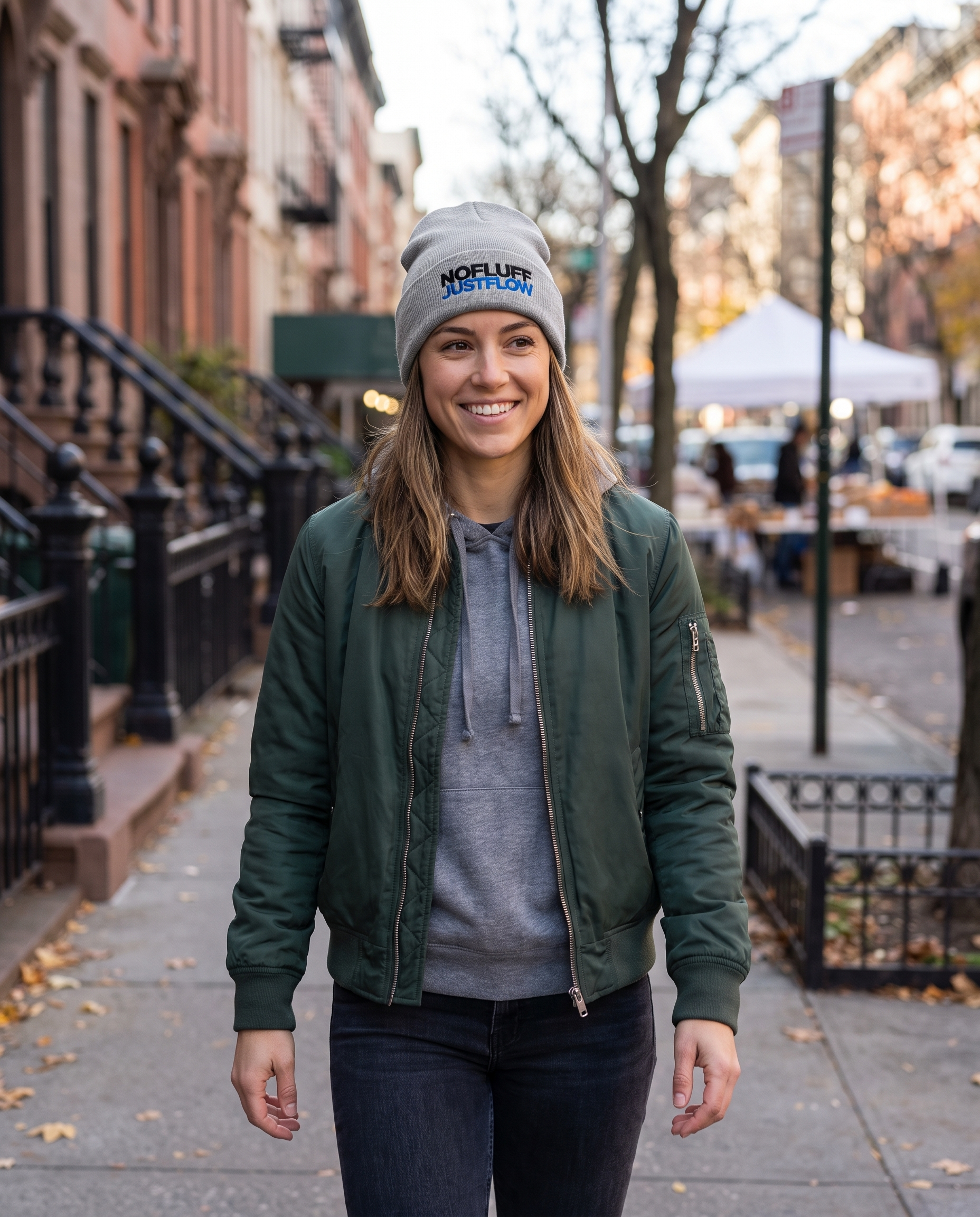 Woman wearing Base1 No Fluff Just Flow Beanie on a city street
