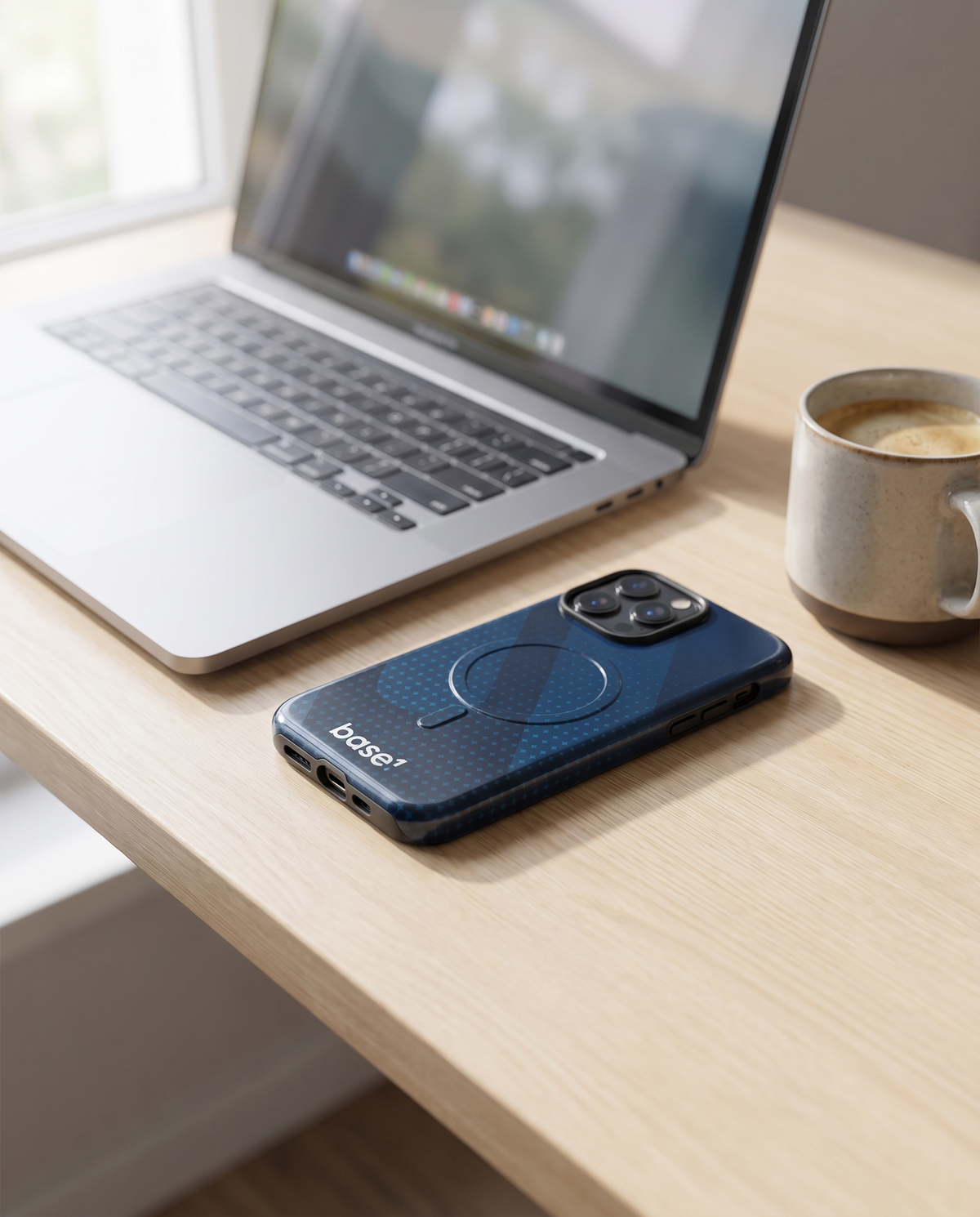Base1 Half Tone MagSafe case on iPhone on a desk