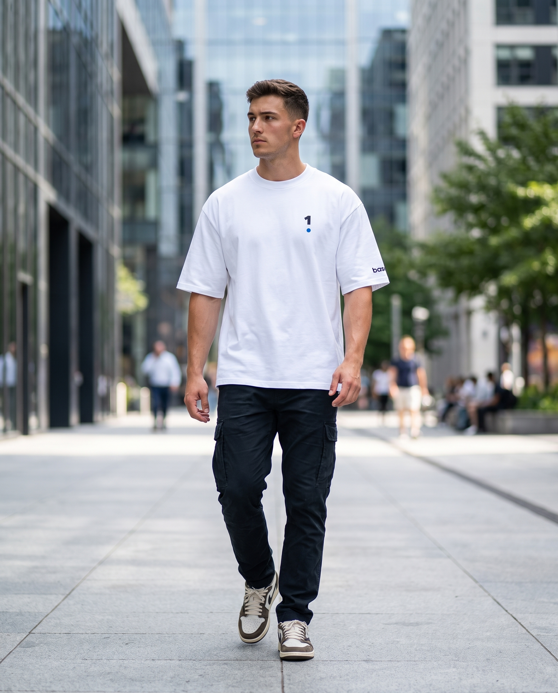 Man wearing Base1 Logo Oversized Heavyweight Tee on a city street