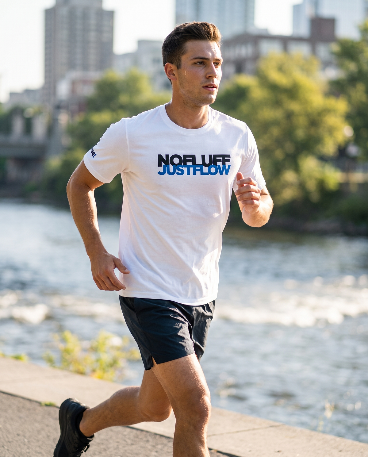 Man running outdoors in Base1 Just Flow athletic t-shirt