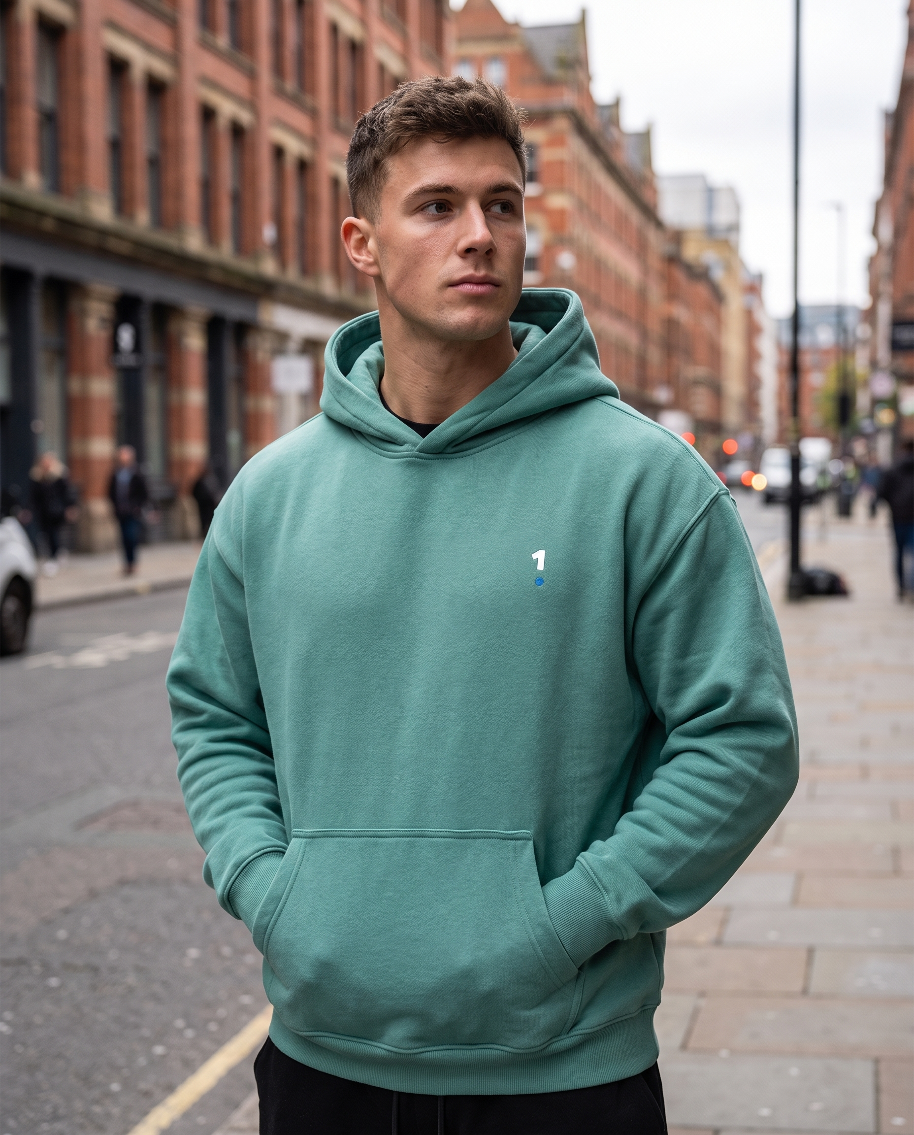 Man wearing Base1 Oversize Fleeced Hoodie on a city street