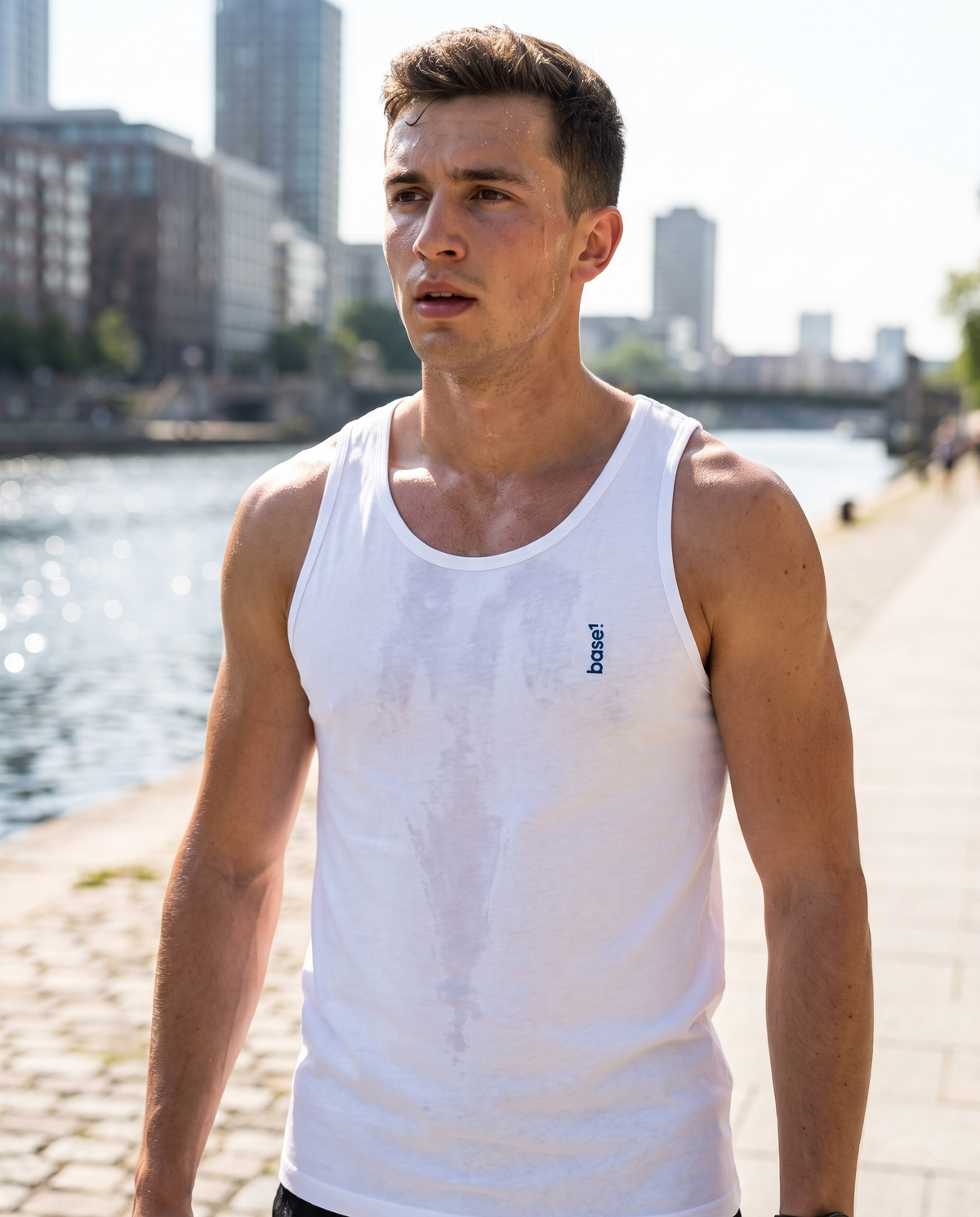 Man in 1 Logo men's premium tank top after an outdoor run