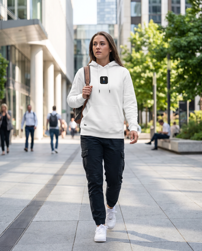 Woman wearing Base1 Icon Logo Eco Hoodie on a city street