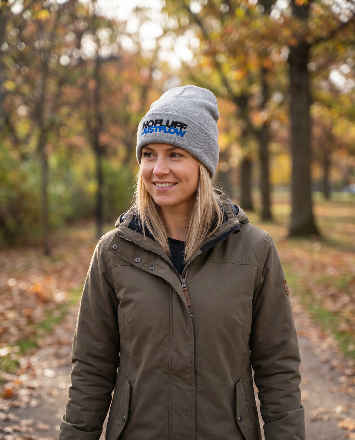 Woman wearing Base1 No Fluff Just Flow Beanie in a park