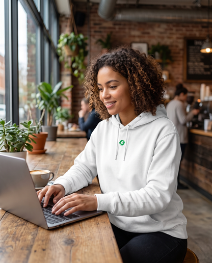 Woman wearing BaseFit Cruiser Organic Hoodie in a cafe