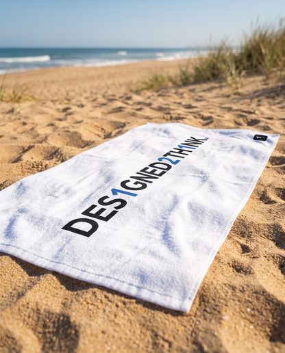 Base1 Designed2Think towel on a sunny beach
